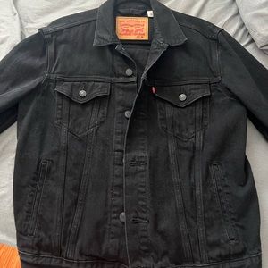 Men’s Levi’s black denim jacket.